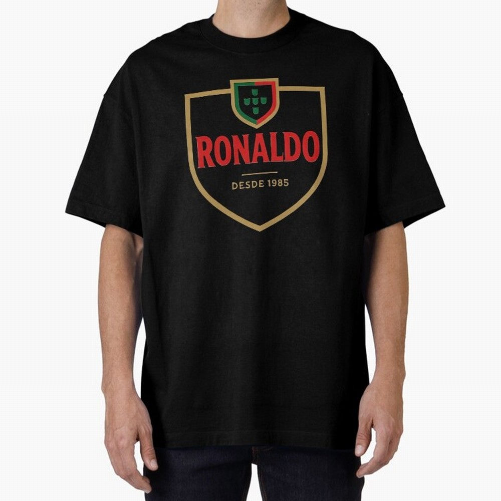 Ronaldo Emblem Sticker ¨C Gold Crest Parody Design Oversized T-Shirt Showcase FIFA World Cup 2026 Spirit, Capturing England and Germany, Messi and Cristiano Ronaldo, Supporter Pride, Iconic Celebrations, Legendary Names and Global Match Day Energy;