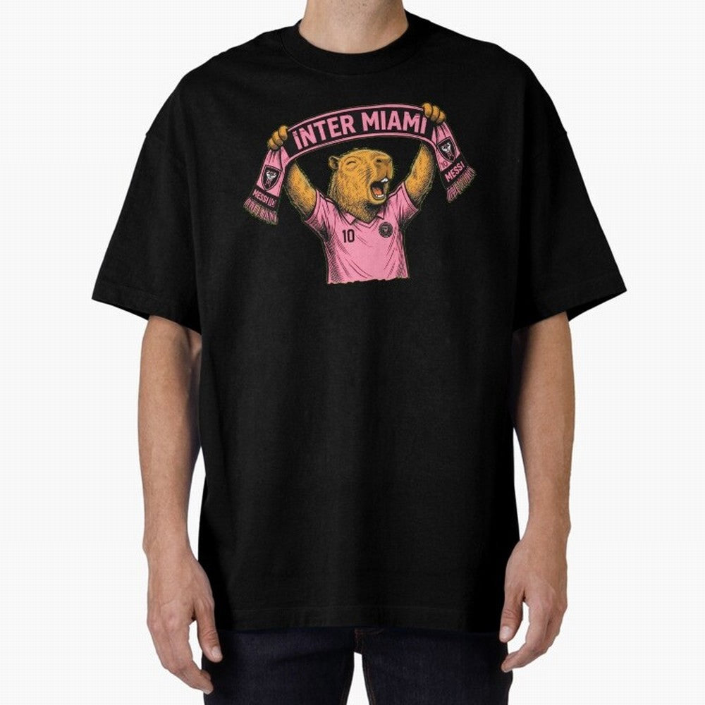 Capybara Inter Miami Fan Celebrating ¨C Funny Soccer Illustration with Scarf Oversized T-Shirt Discover Global Football Passion for FIFA World Cup 2026, Capturing Messi, Neymar and Mbappe, England, Game Day Rituals, Football Legends, Country Pride